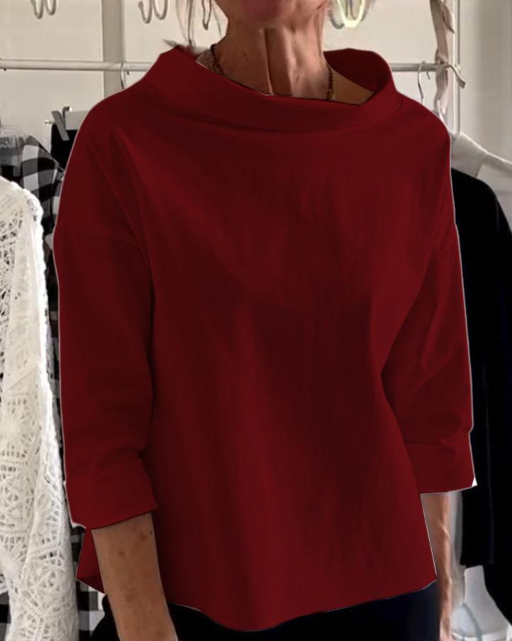 Top élégant à col haut pour femme