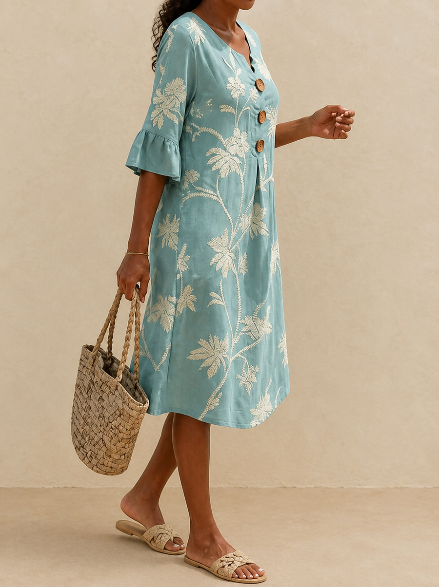 Robe Fiorenza — vue de profil, coupe midi ajustée