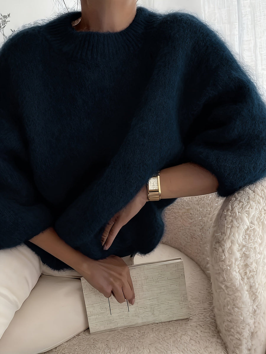 Pull oversize femme — vue de profil, tombé souple et fluide