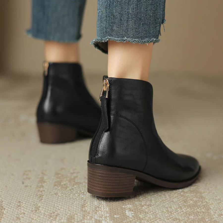 Botins de salto baixo e estilo minimalista