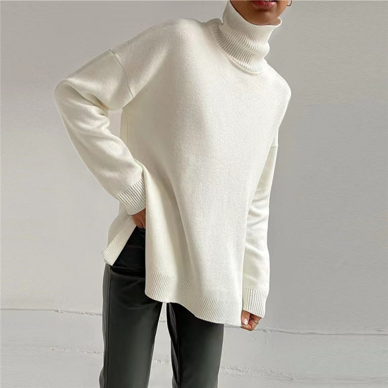 Sweat col roulé oversize — détail des manches avec finition côtelée
