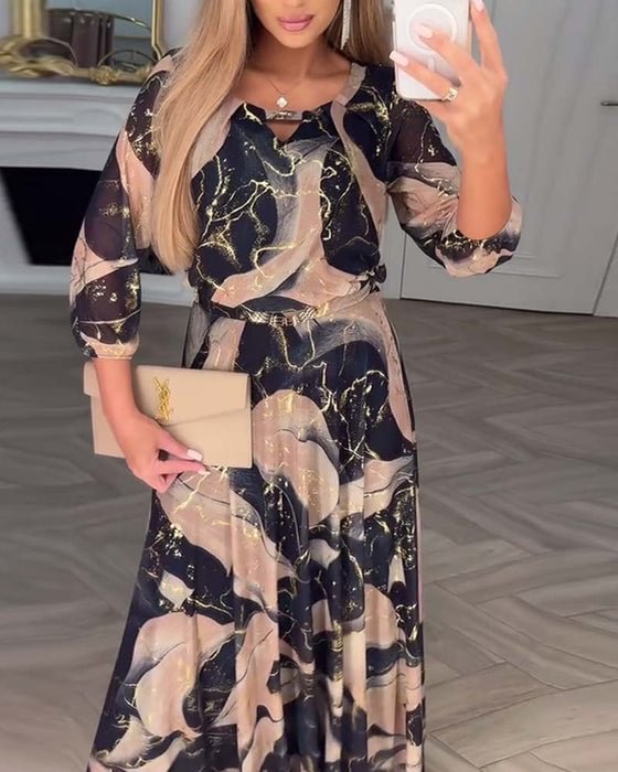 Élégante robe en mousseline imprimée à manches trois-quarts