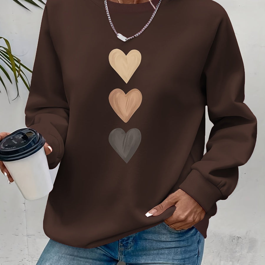 Pull col rond motif cœurs brodés — détail encolure col rond