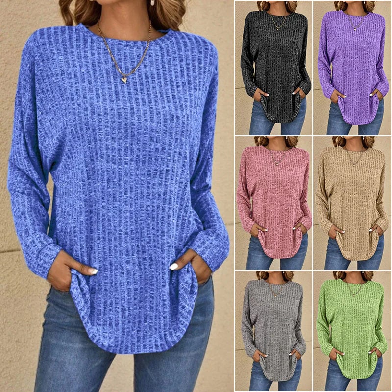 Pull ample col rond — vue de profil, tombé fluide