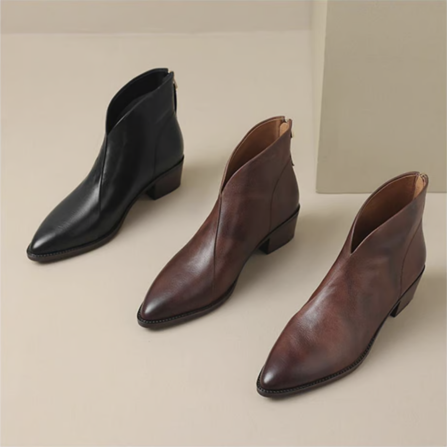 Botins de salto baixo e estilo minimalista