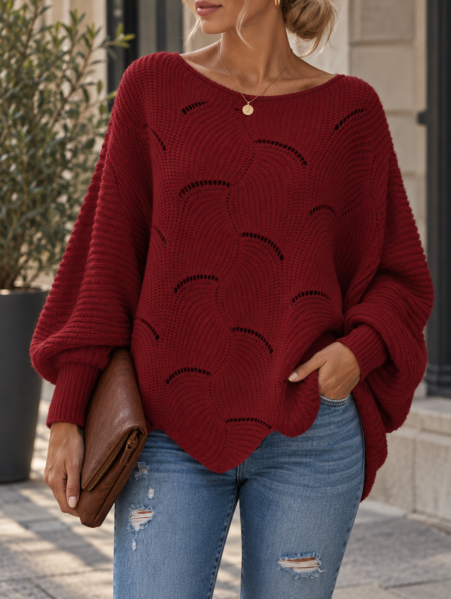 Pull oversize motif ondulé ajouré — détail clair-obscur