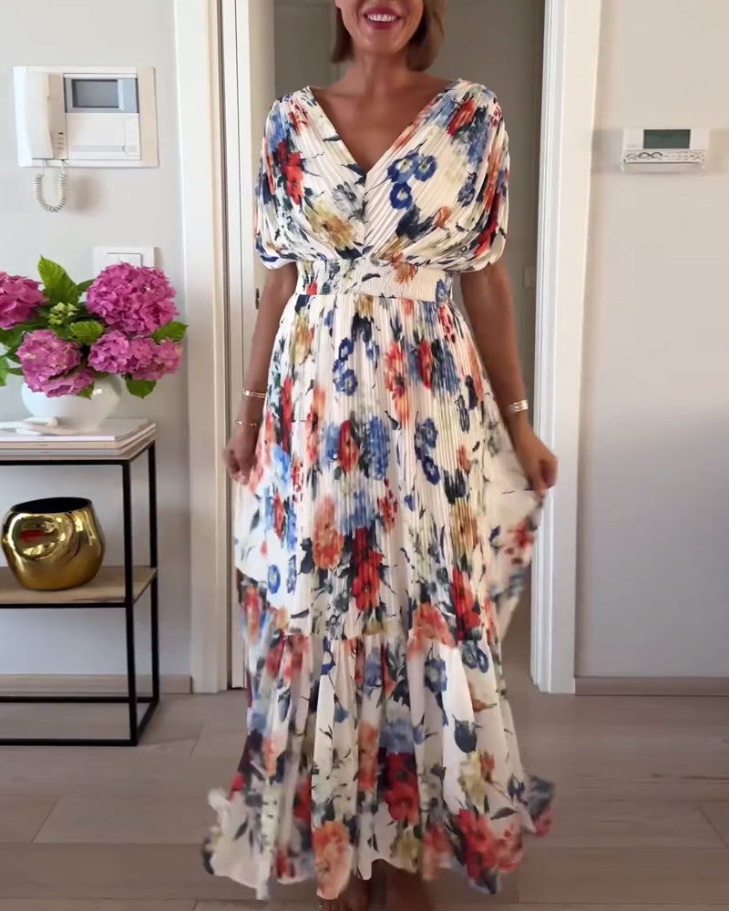 Robe longue fleurie — vue de profil montrant la coupe fluide