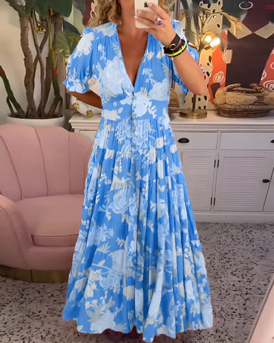 Carine | Robe à fleurs avec encolure en V et poches