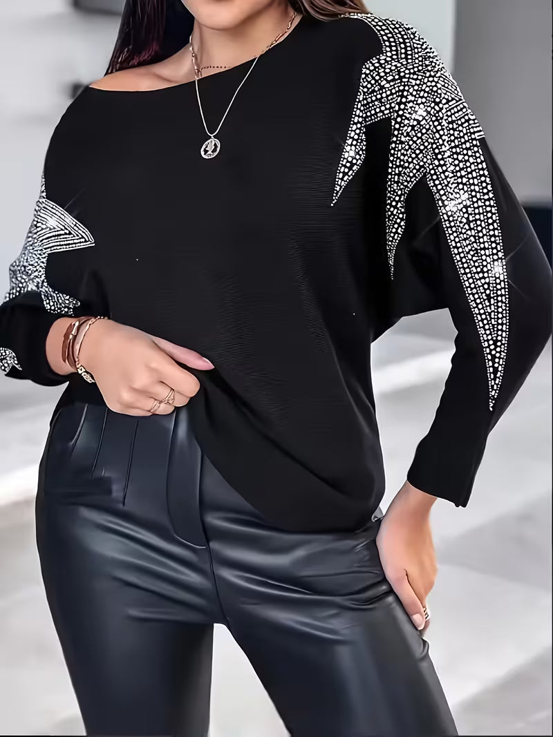Pull imprimé étoilé — gros plan sur la texture et l'imprimé