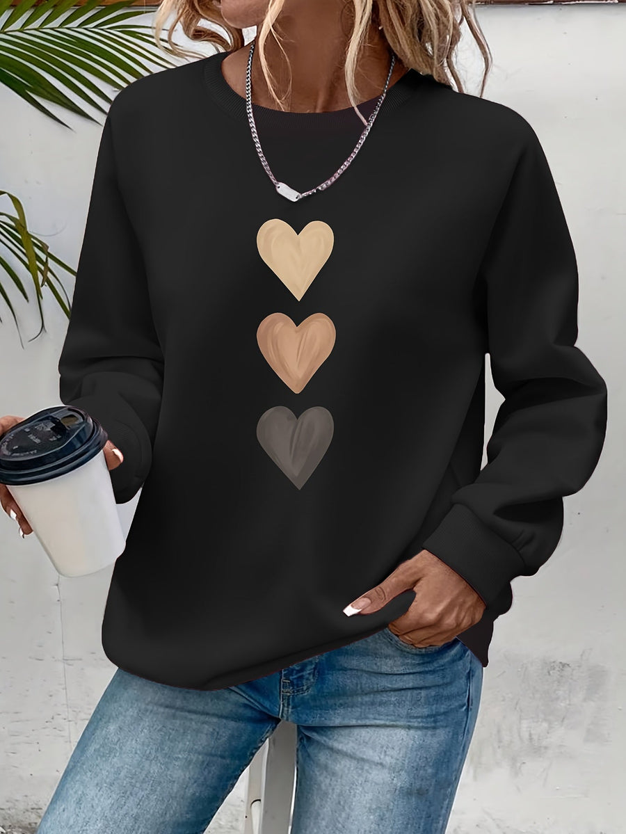 Pull col rond motif cœurs brodés — vue de face en buste
