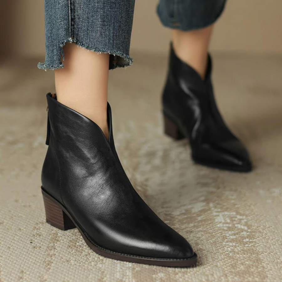 Botins de salto baixo e estilo minimalista