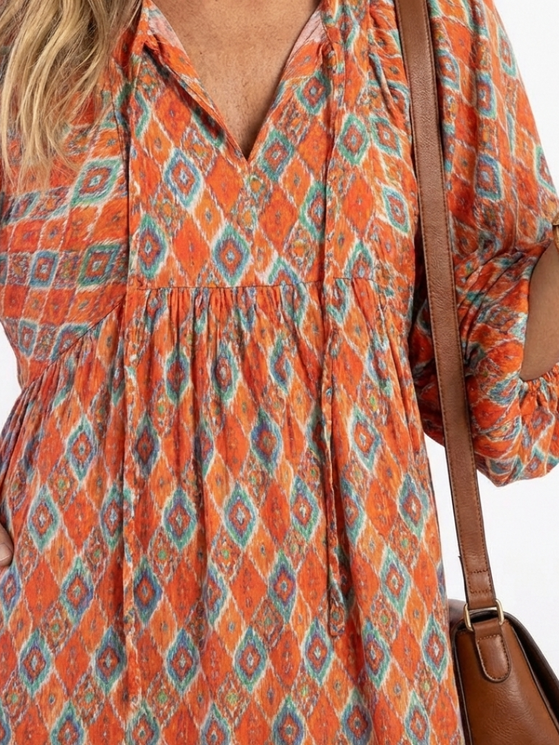 Robe midi fluide géométrique — vue de profil silhouette