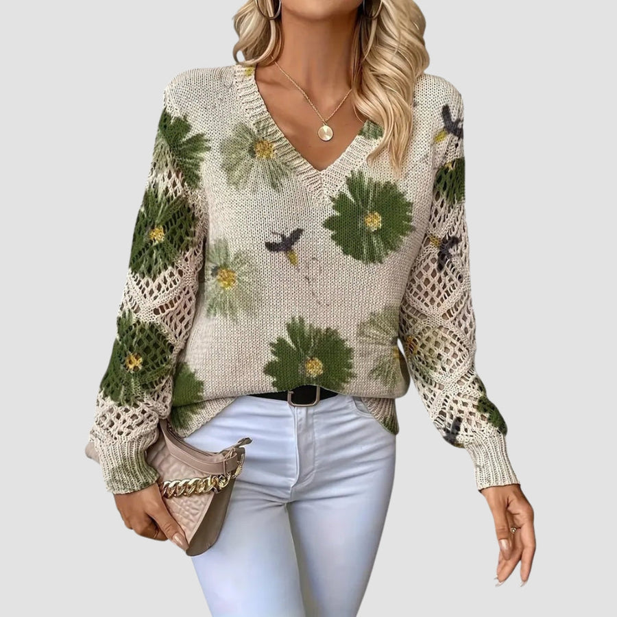 Pull fleuri col V — détail du motif floral en gros plan
