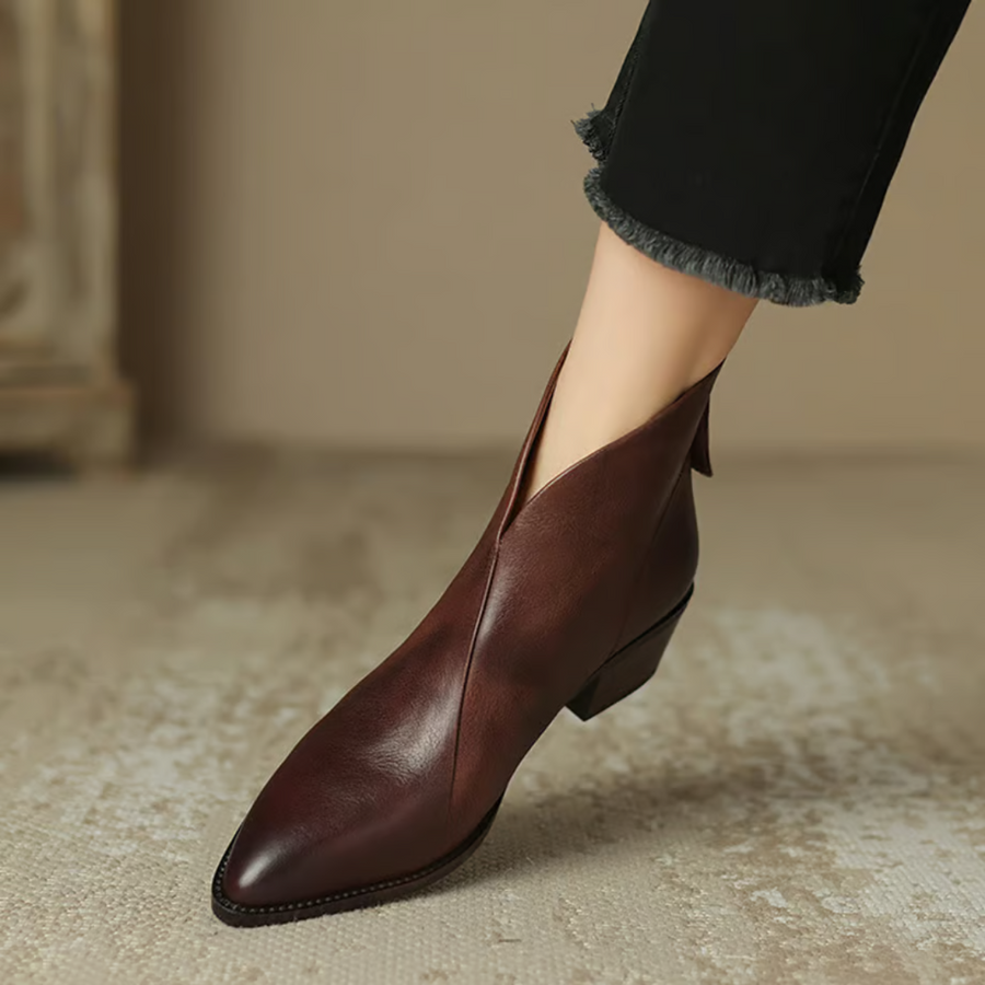 Botins de salto baixo e estilo minimalista