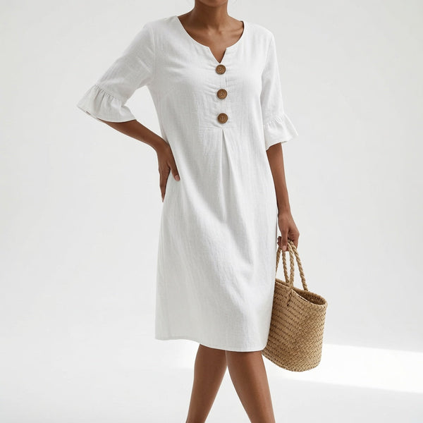 Vestido midi fluido con botones refinados — Elegancia estival atemporal
