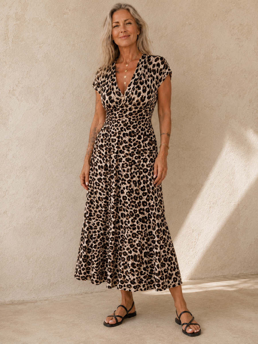 Robe Nathalie léopard — vue de profil, coupe midi fluide