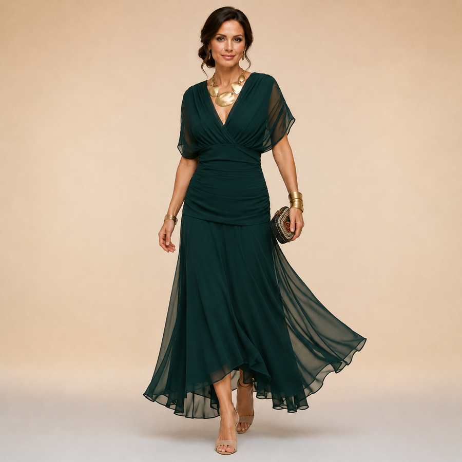 Robe Ondine verte — vue latérale montrant l'ourlet asymétrique