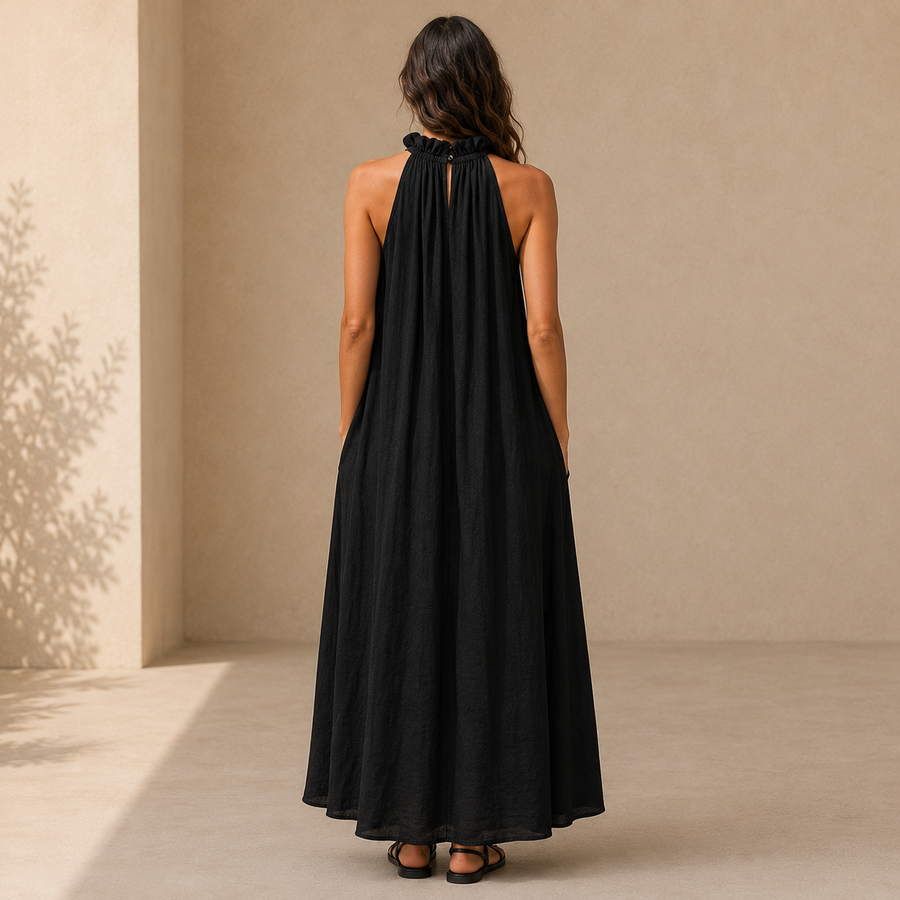 Robe longue fluide avec poches — détail des volants délicats et de la silhouette