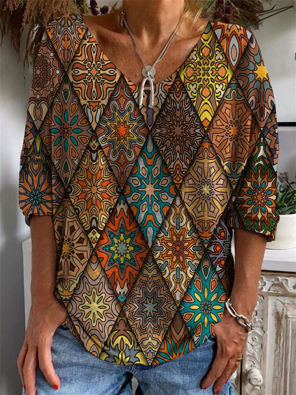 T-shirt à manches longues avec col en V et motifs géométriques