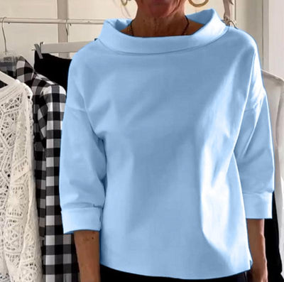 Top élégant à col haut pour femme