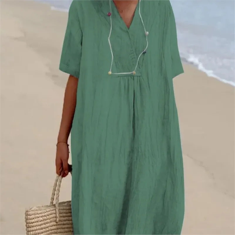 Robe maxi fluide texturée — vue de profil montrant le tombé fluide