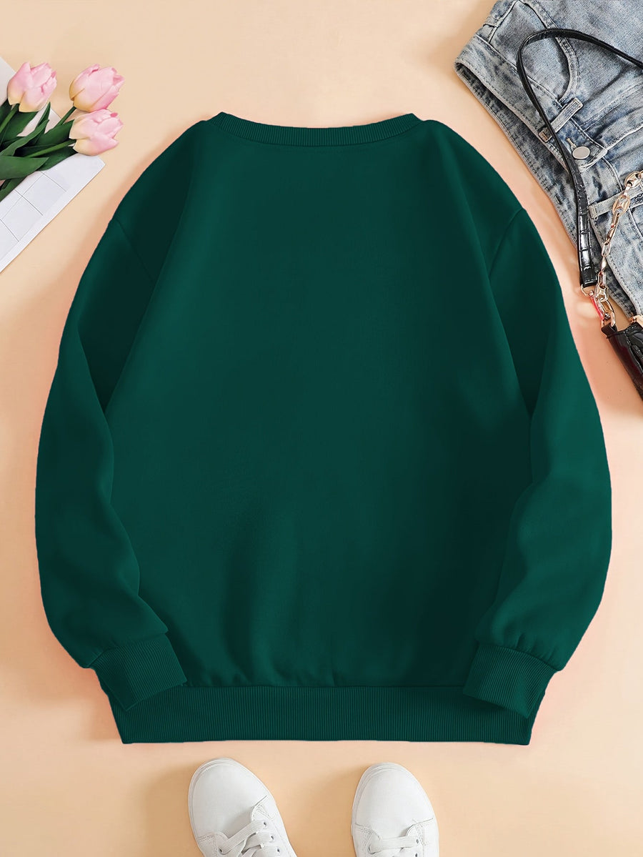 Pull col rond motif cœurs brodés — porter avec jean casual
