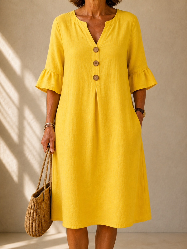 Vestido fluido amarillo sol con volantes y detalles abotonados
