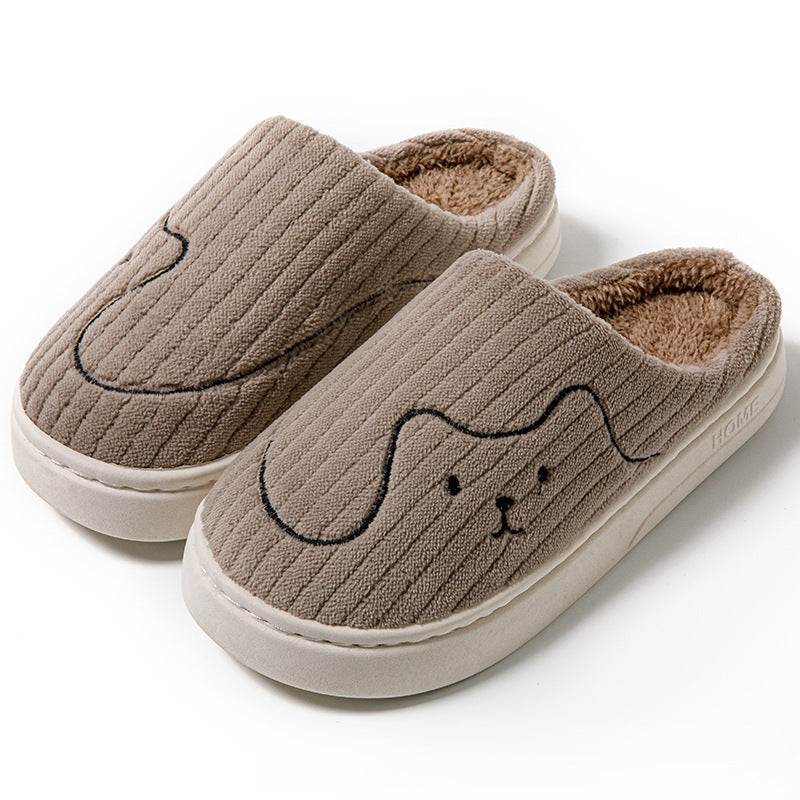 Chaussons fermés motif sourire — détail de la semelle anti-dérapante