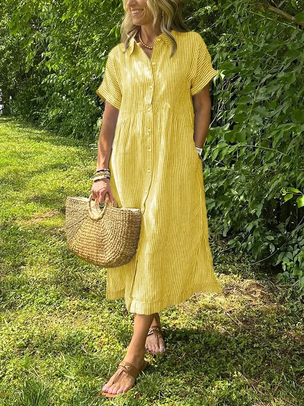 Robe maxi fluide — détail des boutons devant et de l'ouverture