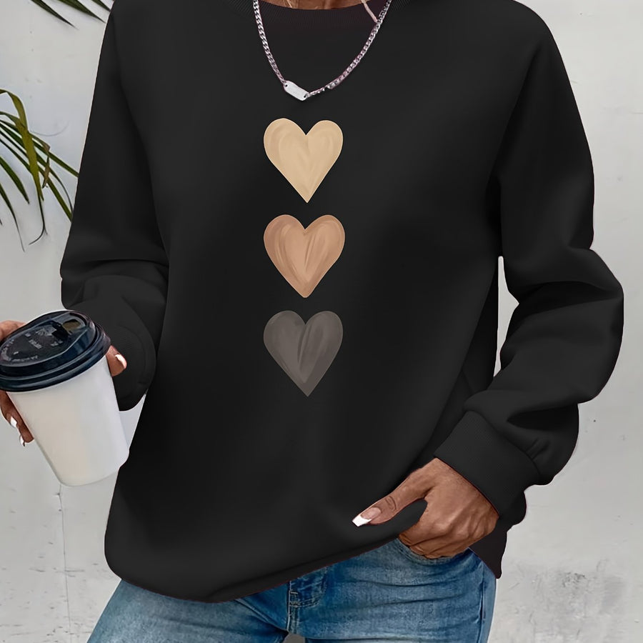 Pull col rond motif cœurs brodés — vue latérale détail coupe