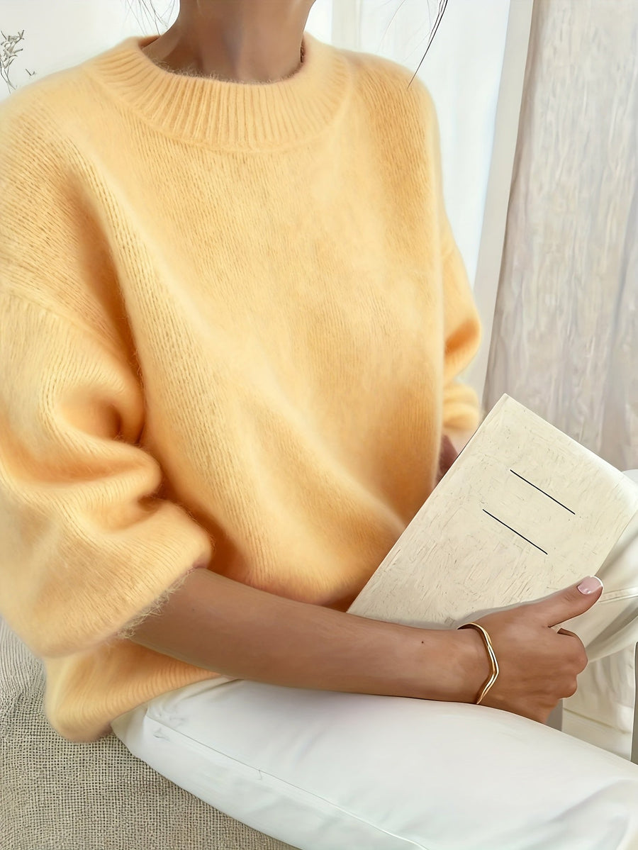 Pull oversize femme — détail de la longueur et de la silhouette générale