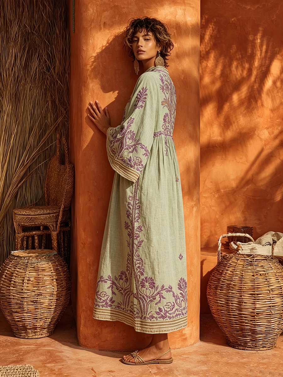 Robe Céleste — détail des broderies florales et du tissu fluide