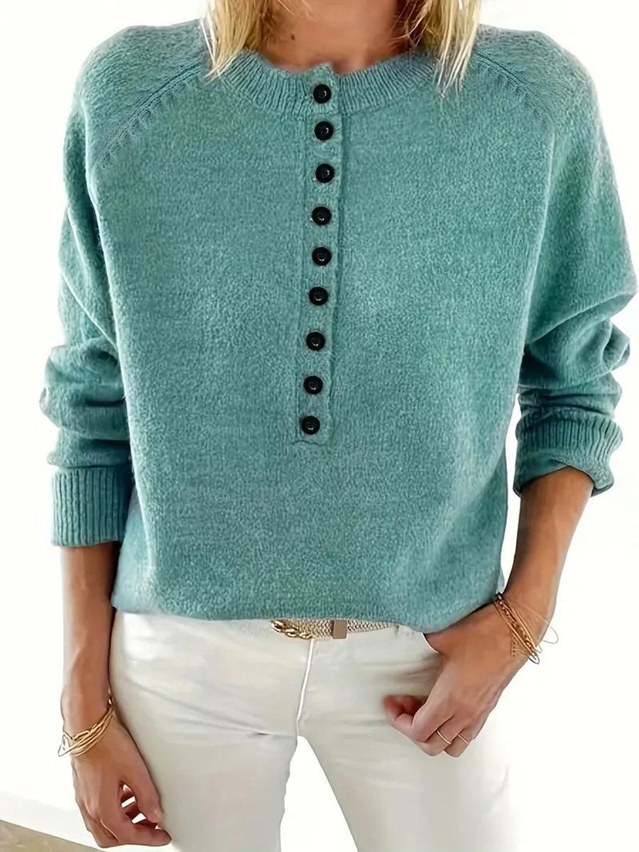 Sweat col Henley boutons partiels — détail du placket de boutons